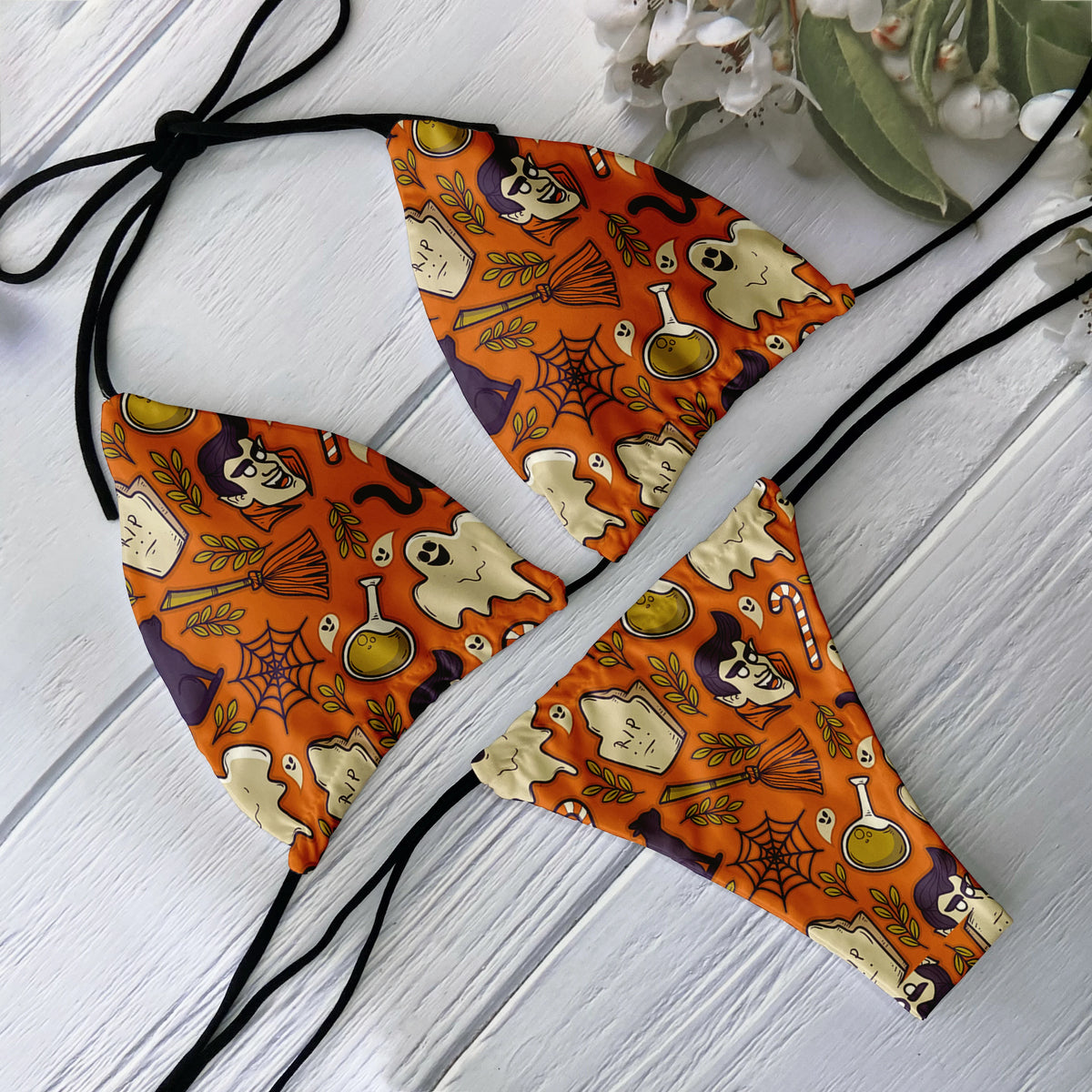 Backless 2-piece bikini set for women with skull print, low waist design, from The Clothing Company Sydney, perfect for beach and surf.