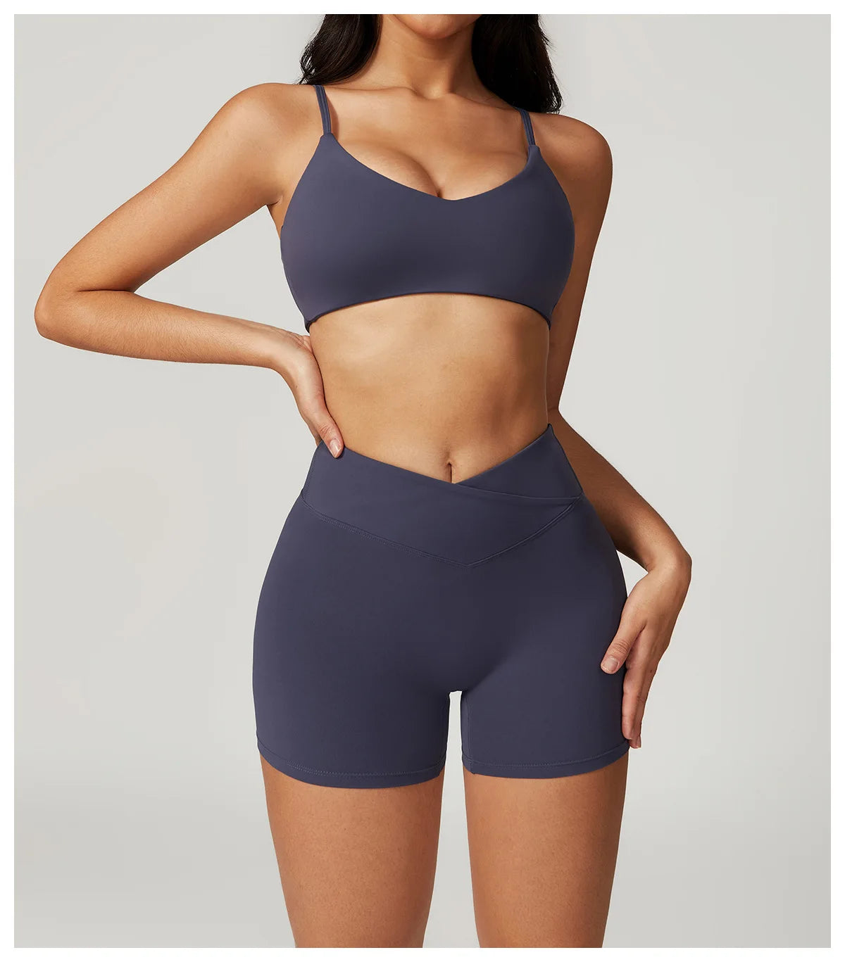 Two-piece women's fitness set including a crop top, sports bra, and gym leggings from The Clothing Company Sydney.