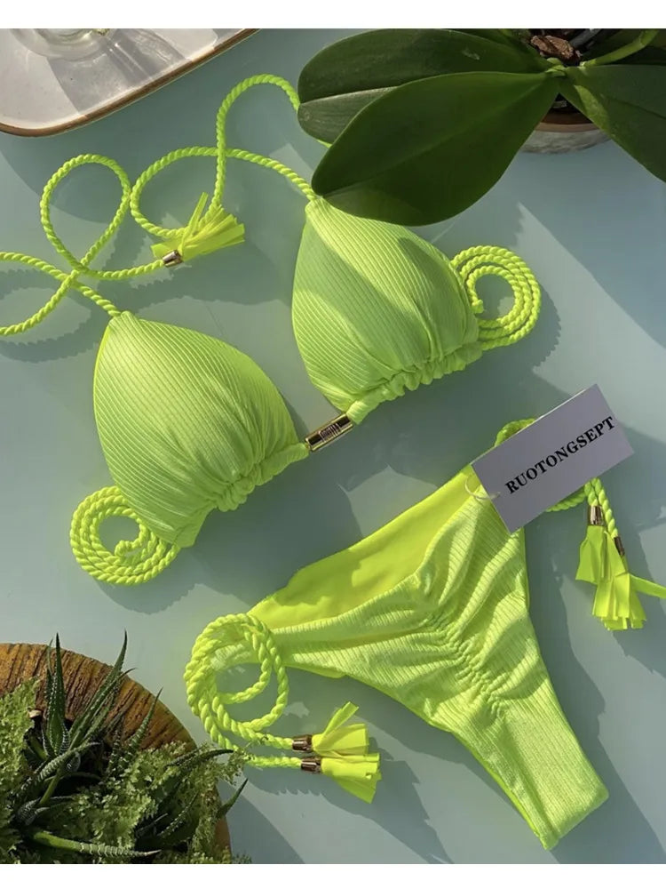 Backless women's bikini swimsuit with rope triangle top, featuring stylish swimwear design from The Clothing Company Sydney.