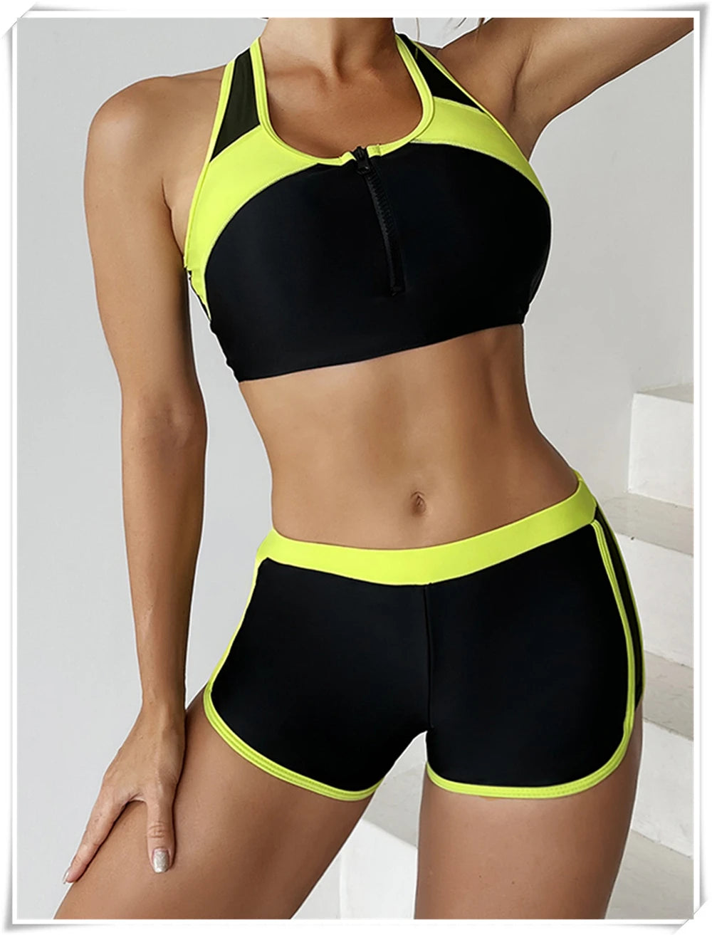 Two-piece swimsuit with zipper tankini top and high-waist shorts from The Clothing Company Sydney, perfect for summer beachwear.