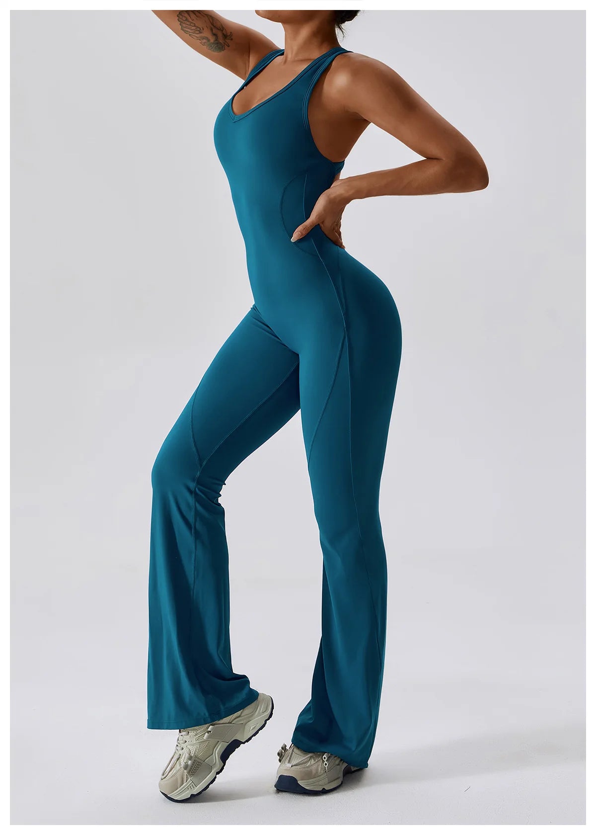 Open back V-neck fitness jumpsuit by The Clothing Company Sydney, stretch workout bodysuit for women, ideal for gym and yoga training.