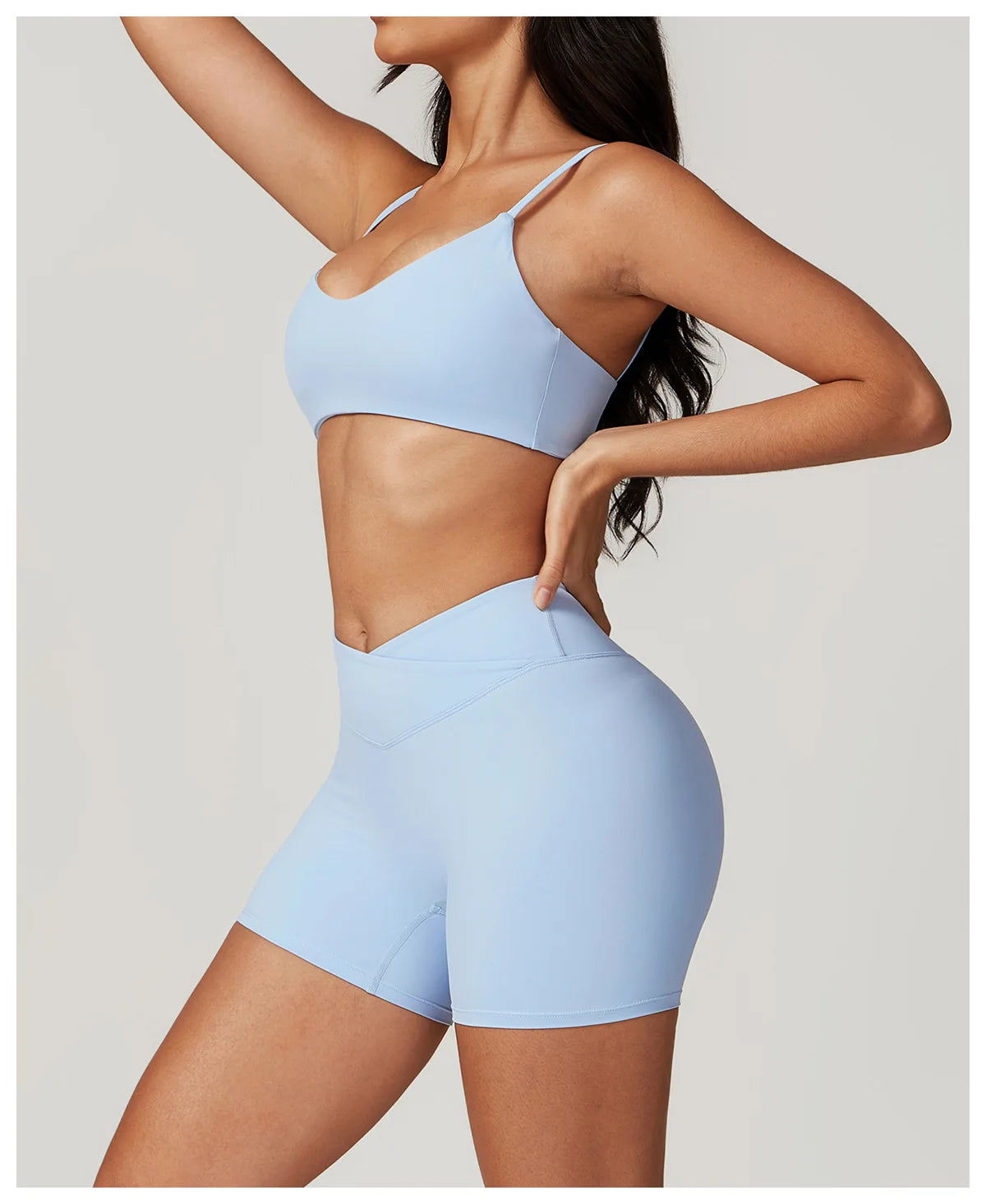 Two-piece women's fitness sportswear set including crop top, sports bra, and leggings from The Clothing Company Sydney.