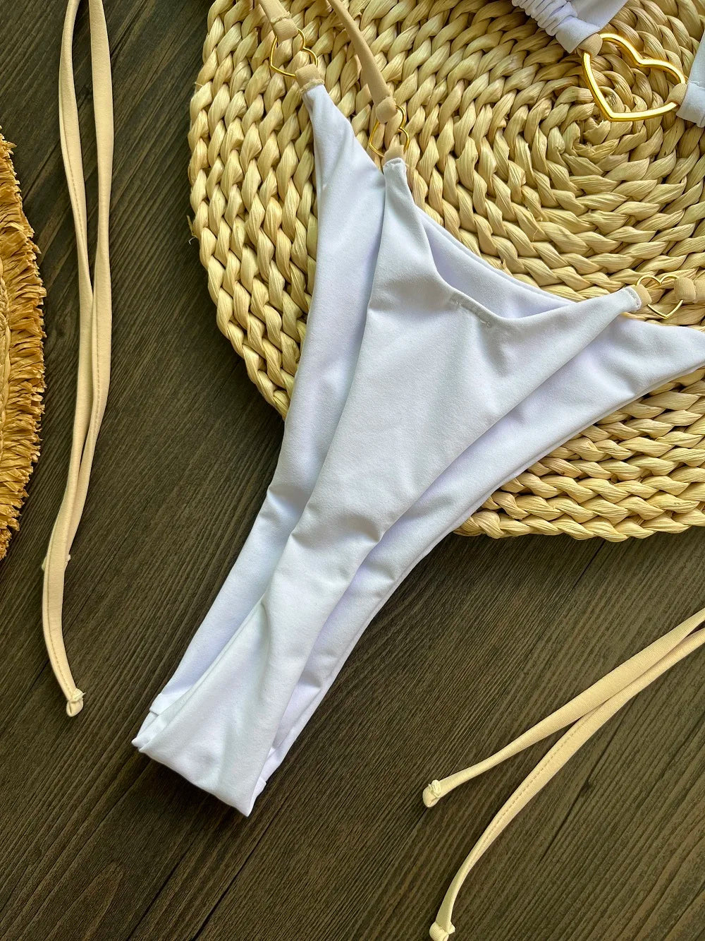 Solid color halter bikini set for women, two-piece swimsuit with triangle top and thong bottom, by The Clothing Company Sydney.