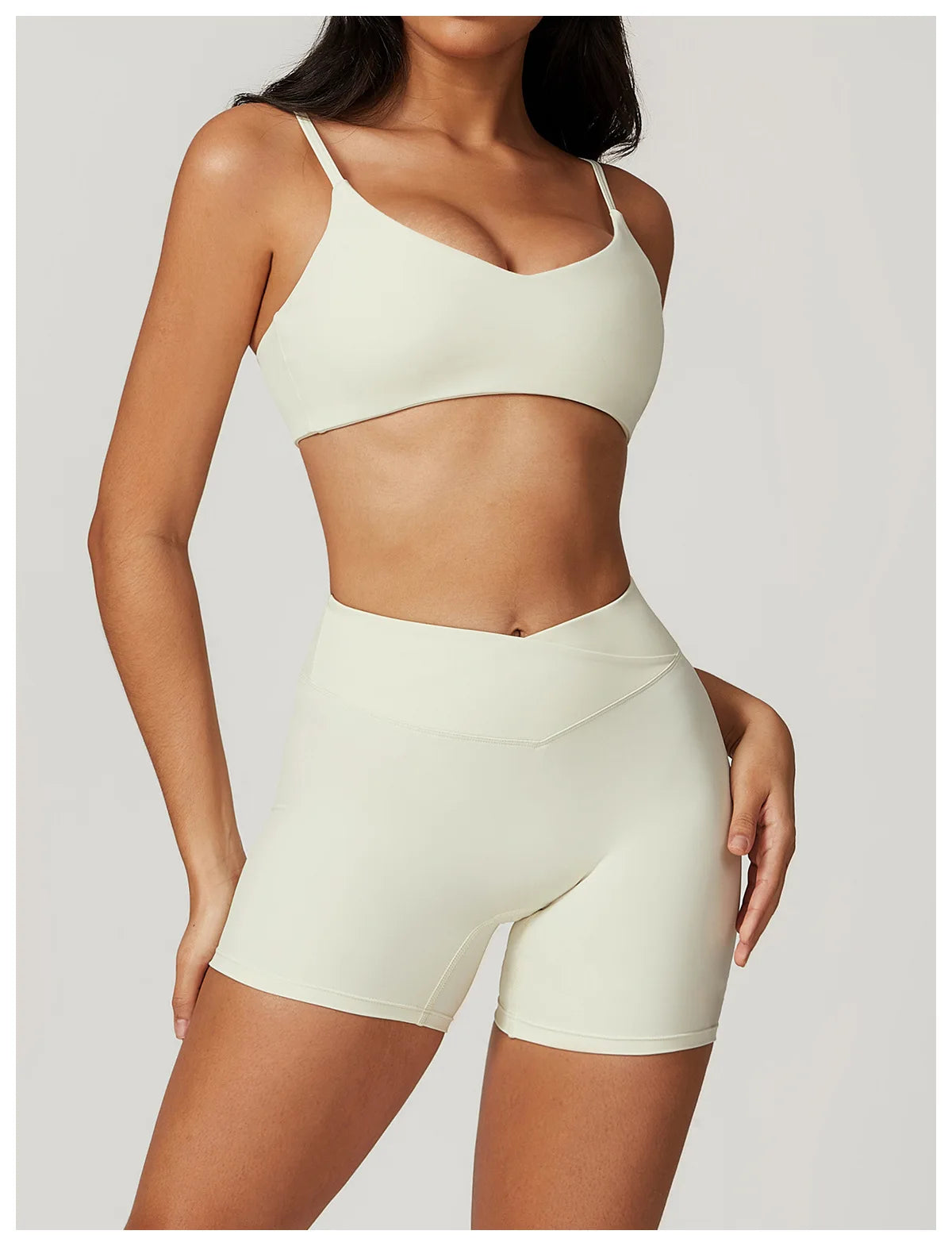 Two-piece women's fitness sportswear set including a short sleeve crop top, sports bra, and leggings from The Clothing Company Sydney.