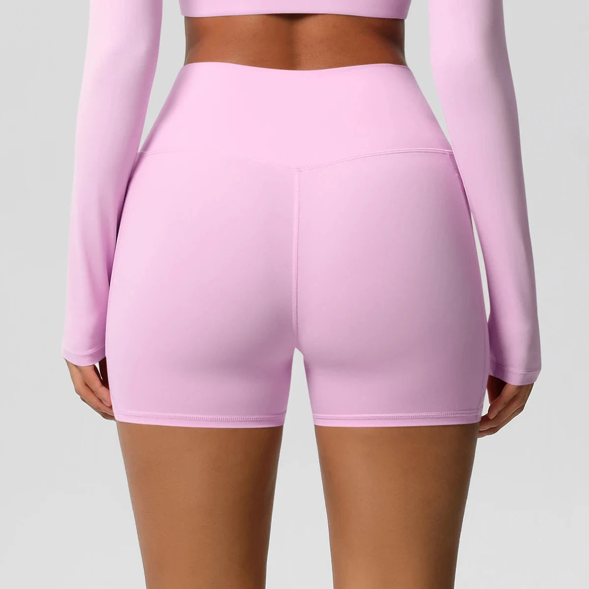 High-waisted bicycle yoga shorts by The Clothing Company Sydney with pockets, quick-drying, breathable fabric, ideal for fitness and cycling.