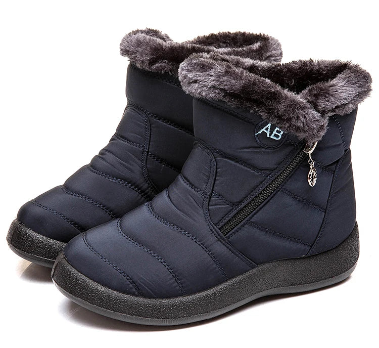 Women’s winter snow boots with warm fur lining, ankle-height footwear from The Clothing Company Sydney, suitable for cold weather.