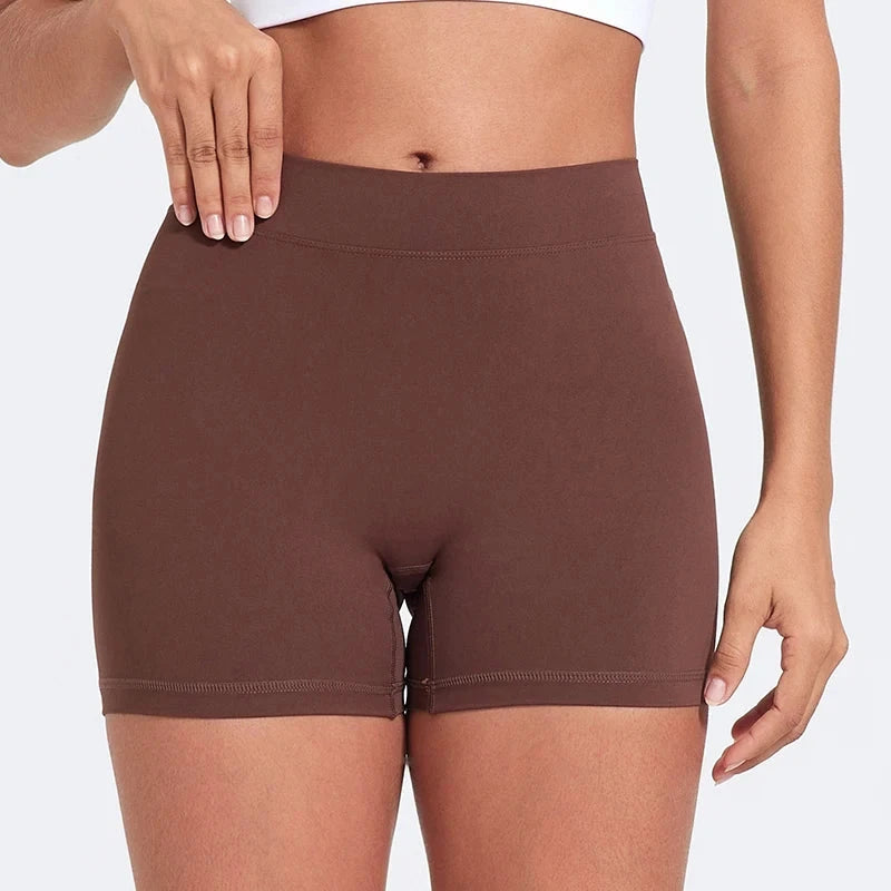 High-waisted V-back yoga shorts from The Clothing Company Sydney, in nylon, tight fit, ideal for training and fitness activities.