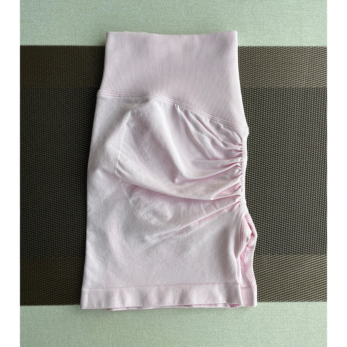 Solid seamless half pants for women by The Clothing Company Sydney, soft fitness shorts ideal for yoga, gym, running, and biking.