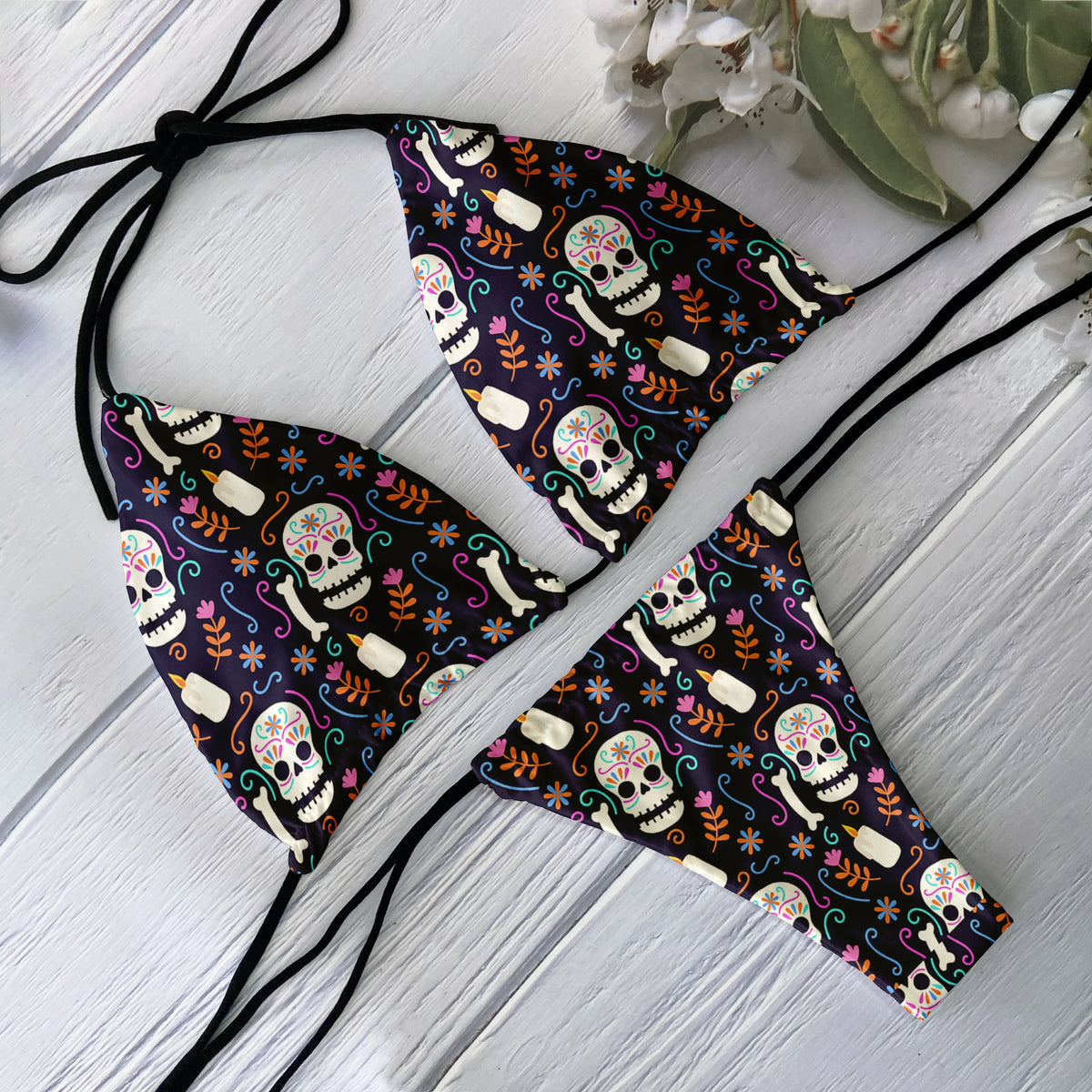 Backless 2-piece bikini set for women with skull print, low waist design, suitable for beach, surfing, and vacation by The Clothing Company Sydney