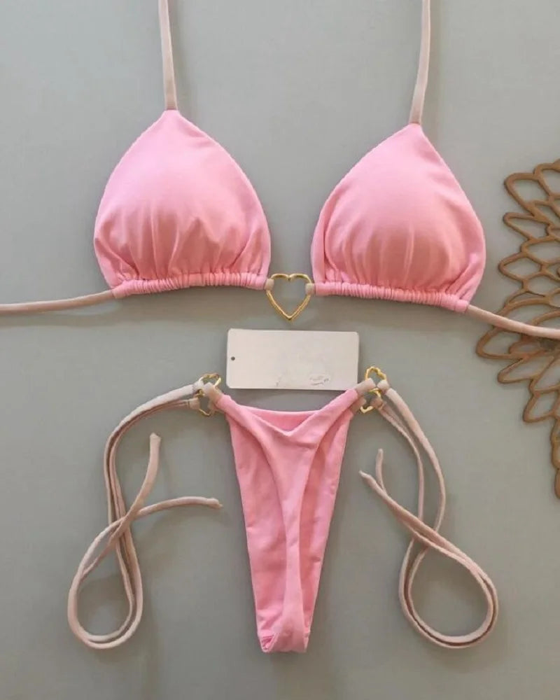 Solid color halter bikini set for women, two-piece swimsuit with triangle top and thong bottom, from The Clothing Company Sydney.