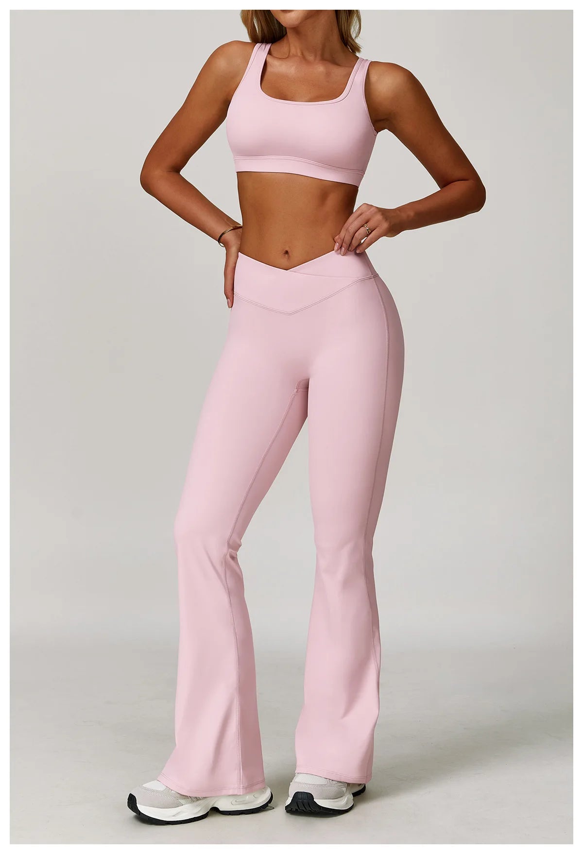 Two-piece women's fitness workout set with sports bra and leggings from The Clothing Company Sydney, designed for yoga and gym workouts.