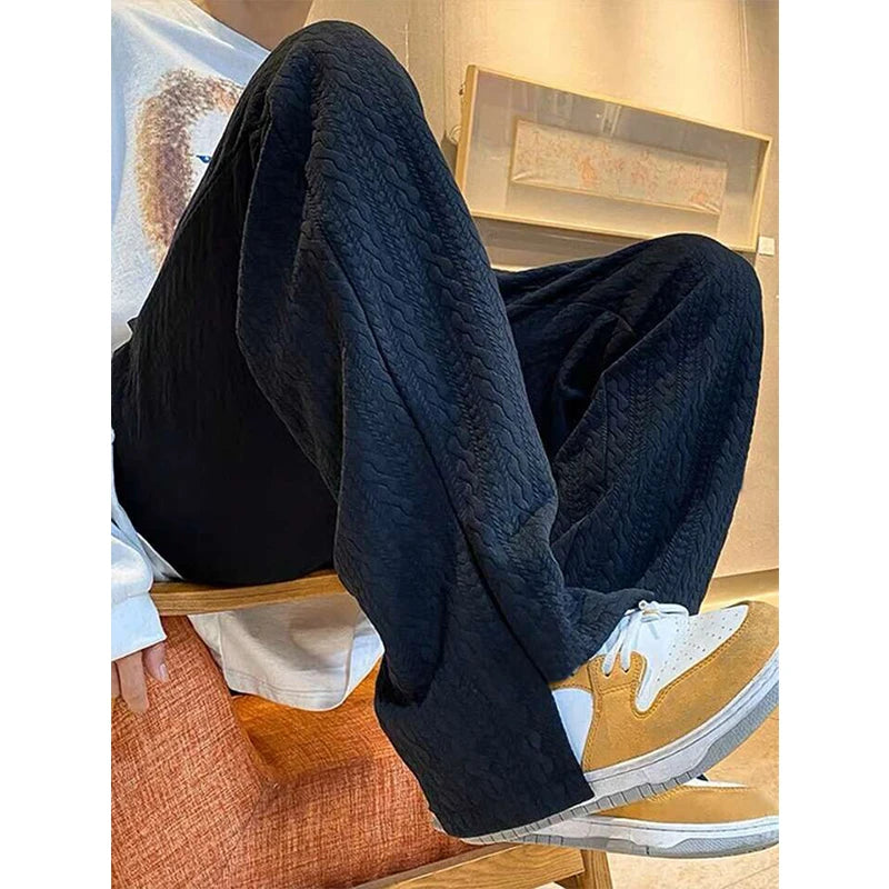 Black men's baggy sportswear joggers with casual fit, suitable for autumn winter gym and hip hop style, by The Clothing Company Sydney.