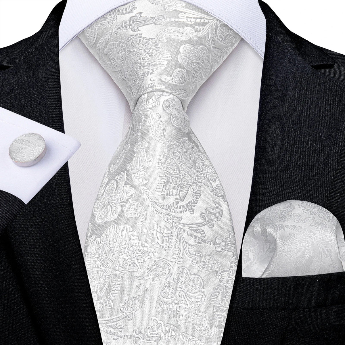 Men's gray paisley silk tie set with wedding tie, pocket square, and cufflinks, featuring elegant, detailed design and luxurious fabric.