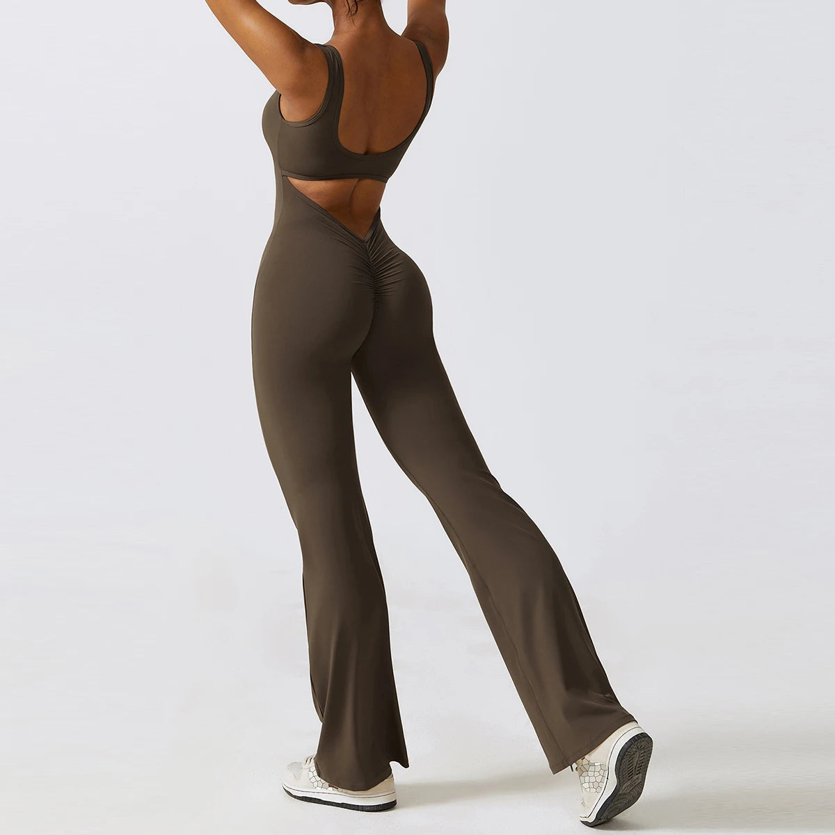 Open back V jumpsuit gym set by The Clothing Company Sydney, women's fitness sportswear with stretch fabric for yoga and workout sessions.