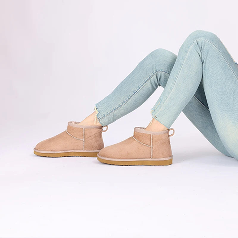 Women's classic snow boots by The Clothing Company Sydney, warm ankle-length footwear suitable for winter conditions.