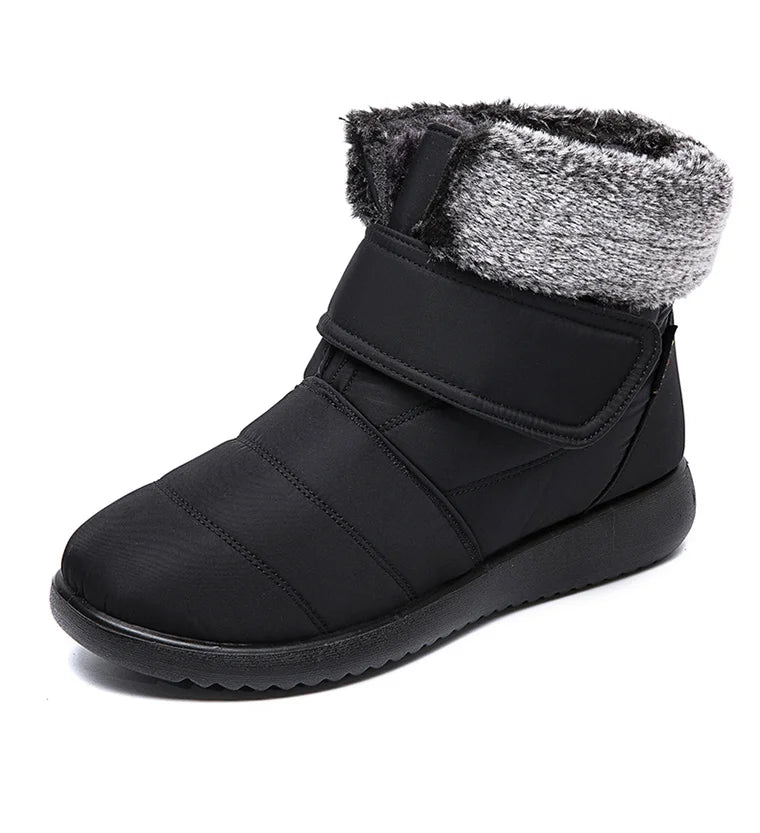 Women's fur-lined waterproof ankle boots by The Clothing Company Sydney, showing plush insole and rugged rubber sole for winter wear.