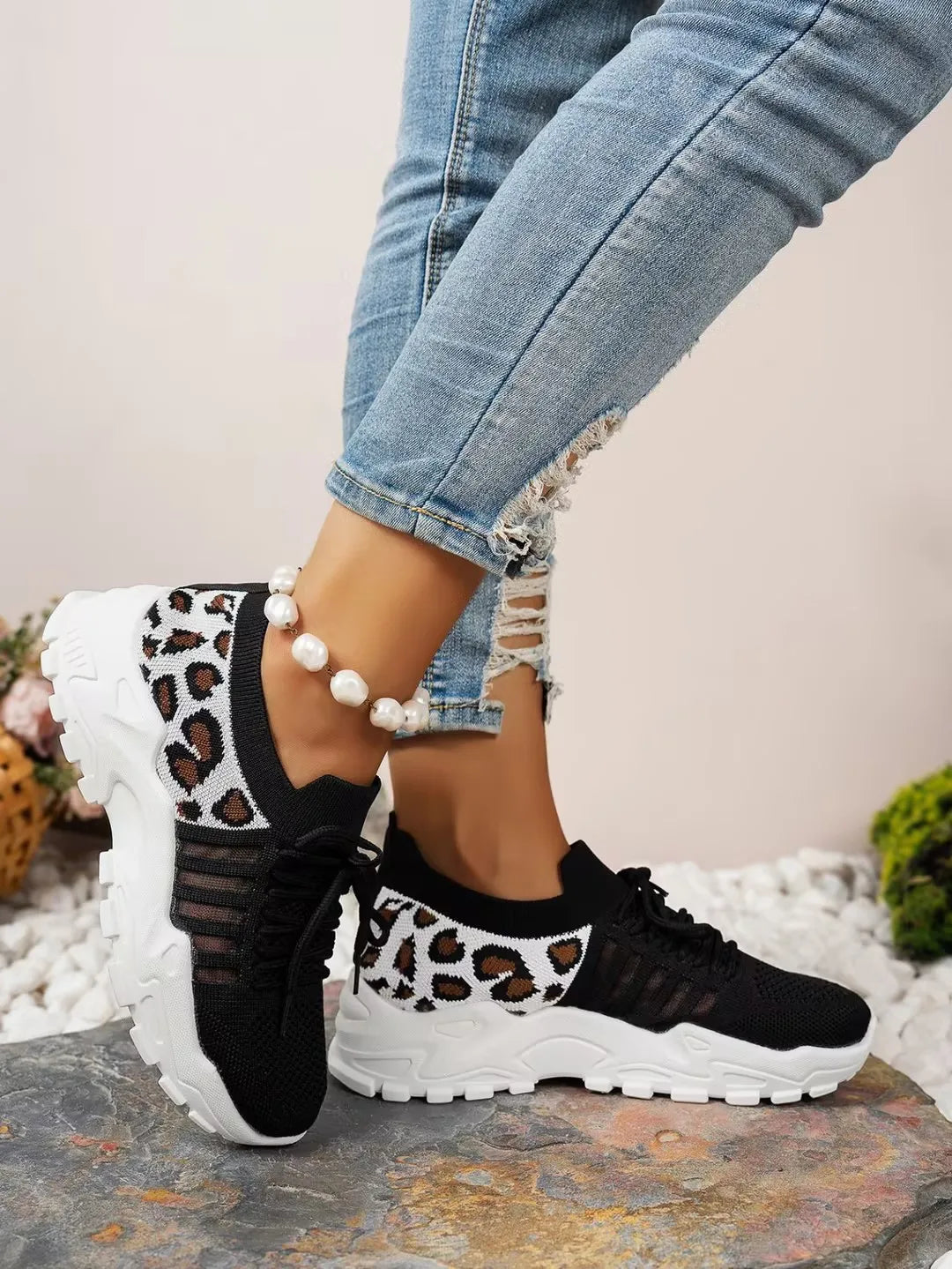 Leopard print women's waterproof sneakers from The Clothing Company Sydney, showcasing stylish footwear with bold animal pattern.