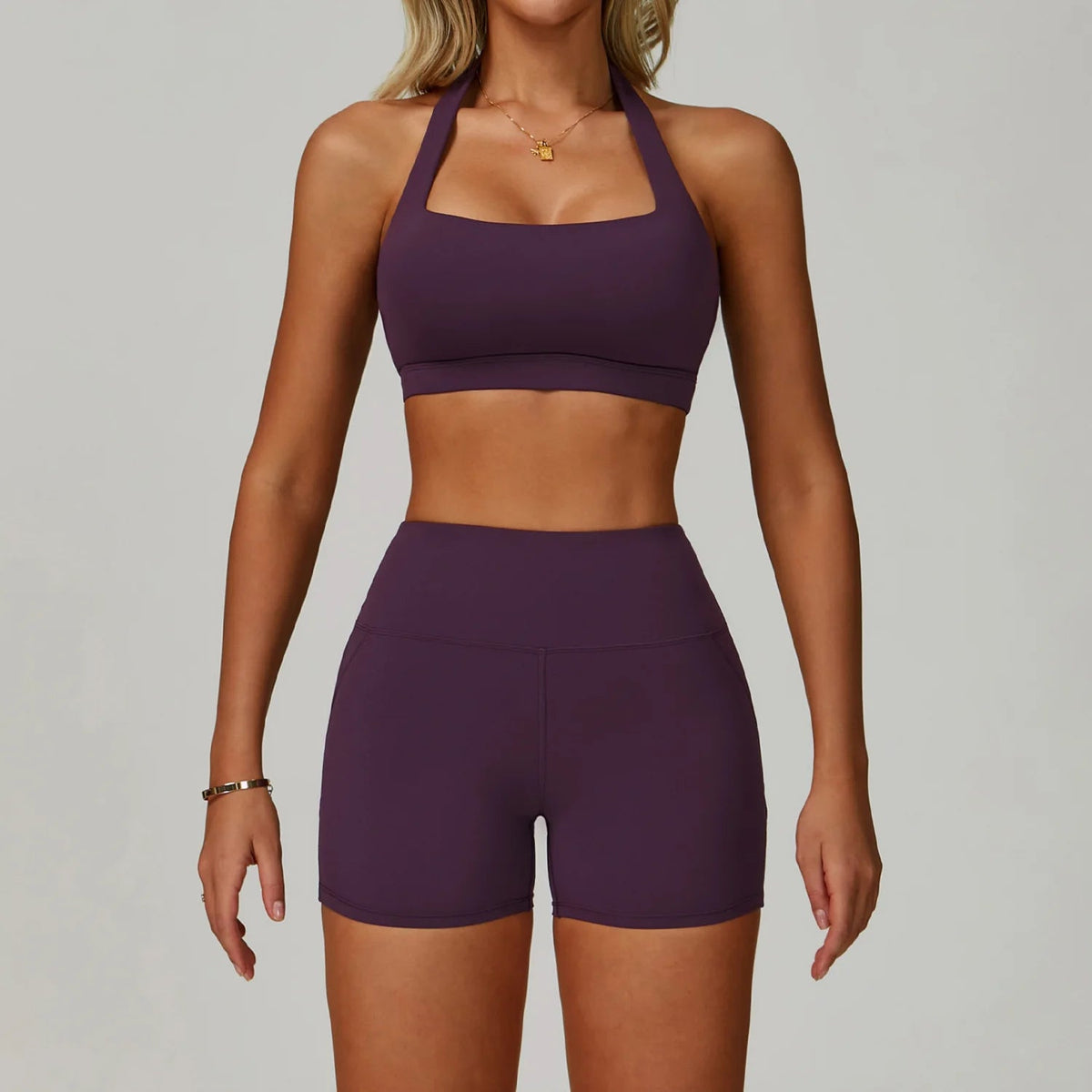 Two-piece women's fitness set from The Clothing Company Sydney, includes sports bra, high-waist leggings, ideal for yoga and workouts.