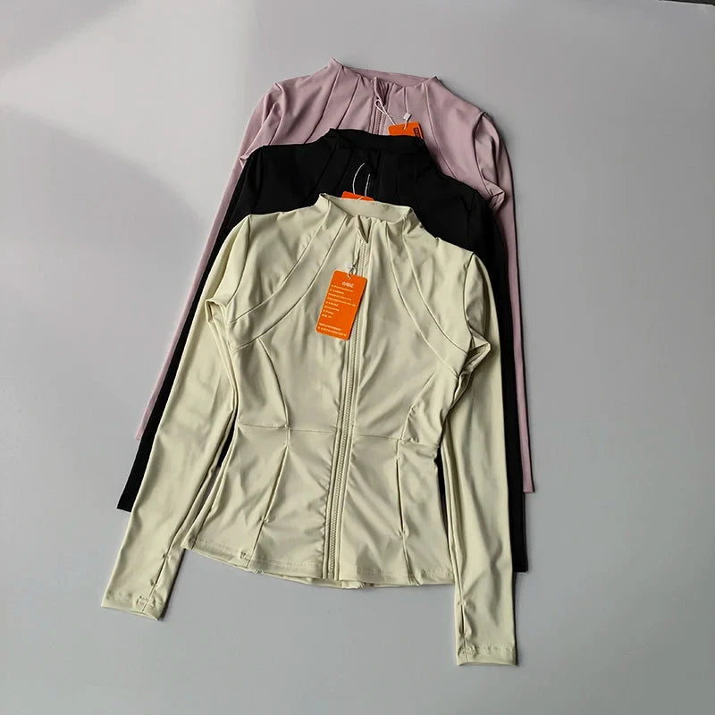 Women’s fitness zip sports jacket by The Clothing Company Sydney, long sleeve workout top with slim fit, ideal for yoga, running, and gym activities.