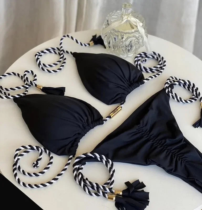 Backless women's bikini swimsuit with rope triangle top and bottoms, featuring stylish swimwear design from The Clothing Company Sydney.
