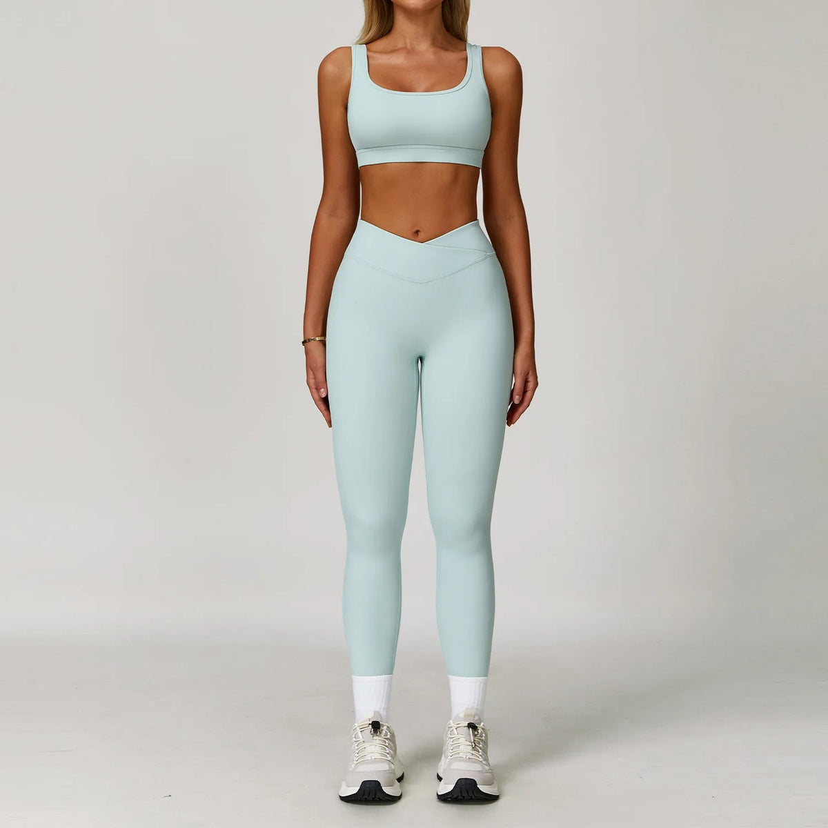 Women's fitness yoga gym clothes set by The Clothing Company Sydney, includes sports bra and matching leggings for workout and running.