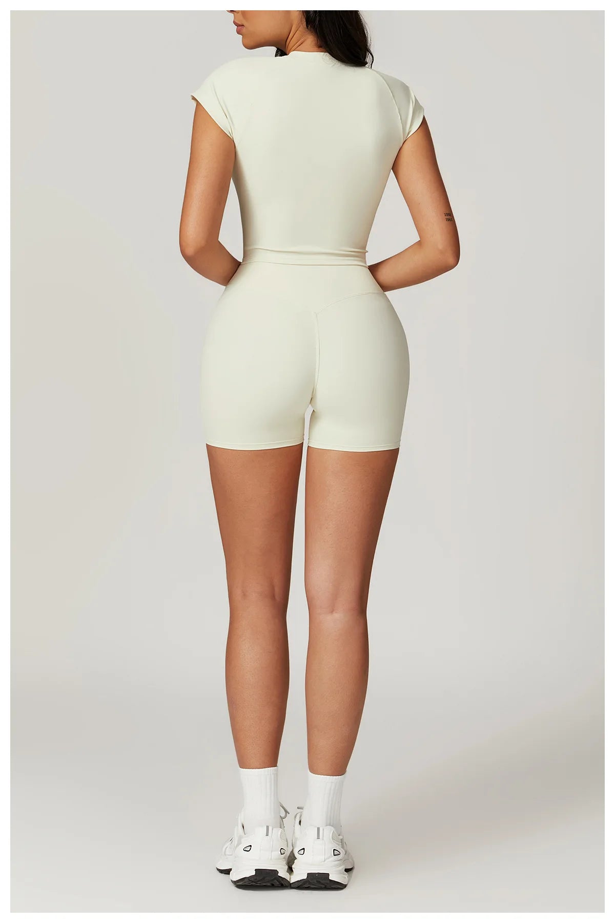 Women’s fitness yoga gym clothes set with short sleeve crop top, sports bra, and gym leggings from The Clothing Company Sydney.