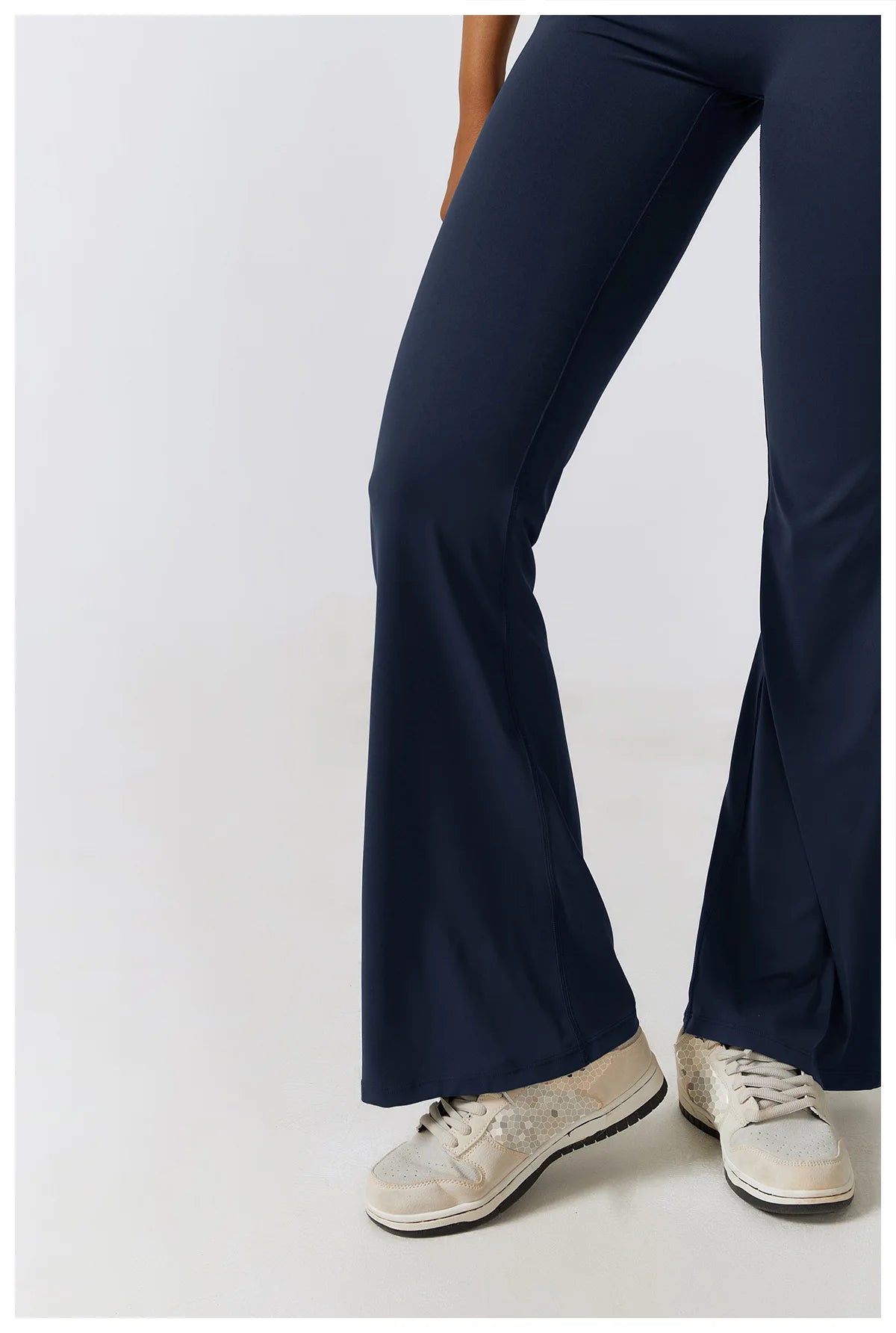 The Clothing Company Sydney women's open back V jumpsuit gym set, stretch yoga and fitness bodysuit for workout and training.