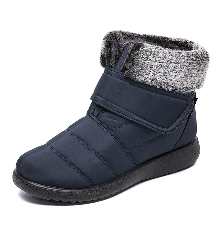 Women's fur-lined waterproof ankle boots by The Clothing Company Sydney with plush insoles and rubber soles for winter warmth.