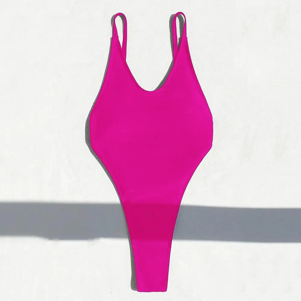 Backless micro thong one-piece swimsuit for women by The Clothing Company Sydney, showing a sleek, minimal design in black.