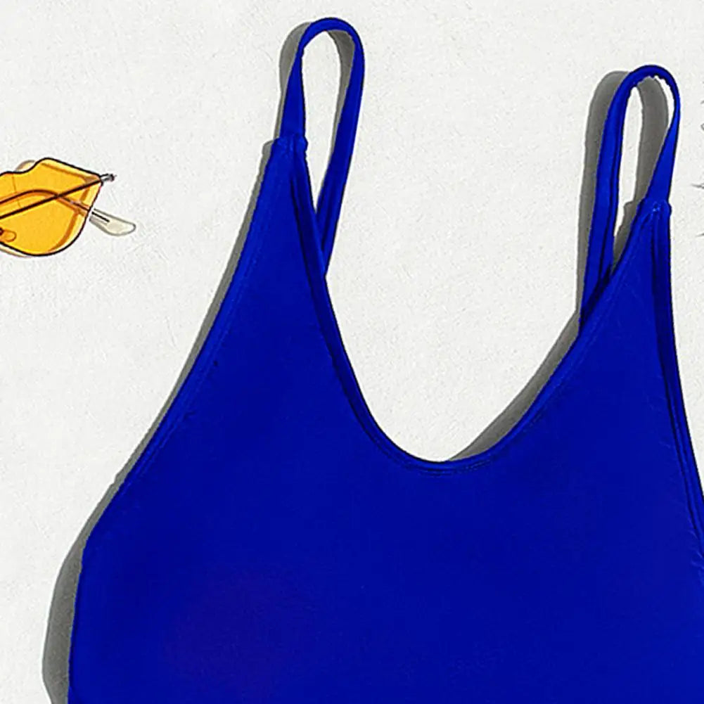 Backless micro thong one-piece swimsuit for women by The Clothing Company Sydney, showcasing a sleek, minimal design with a high-cut style.