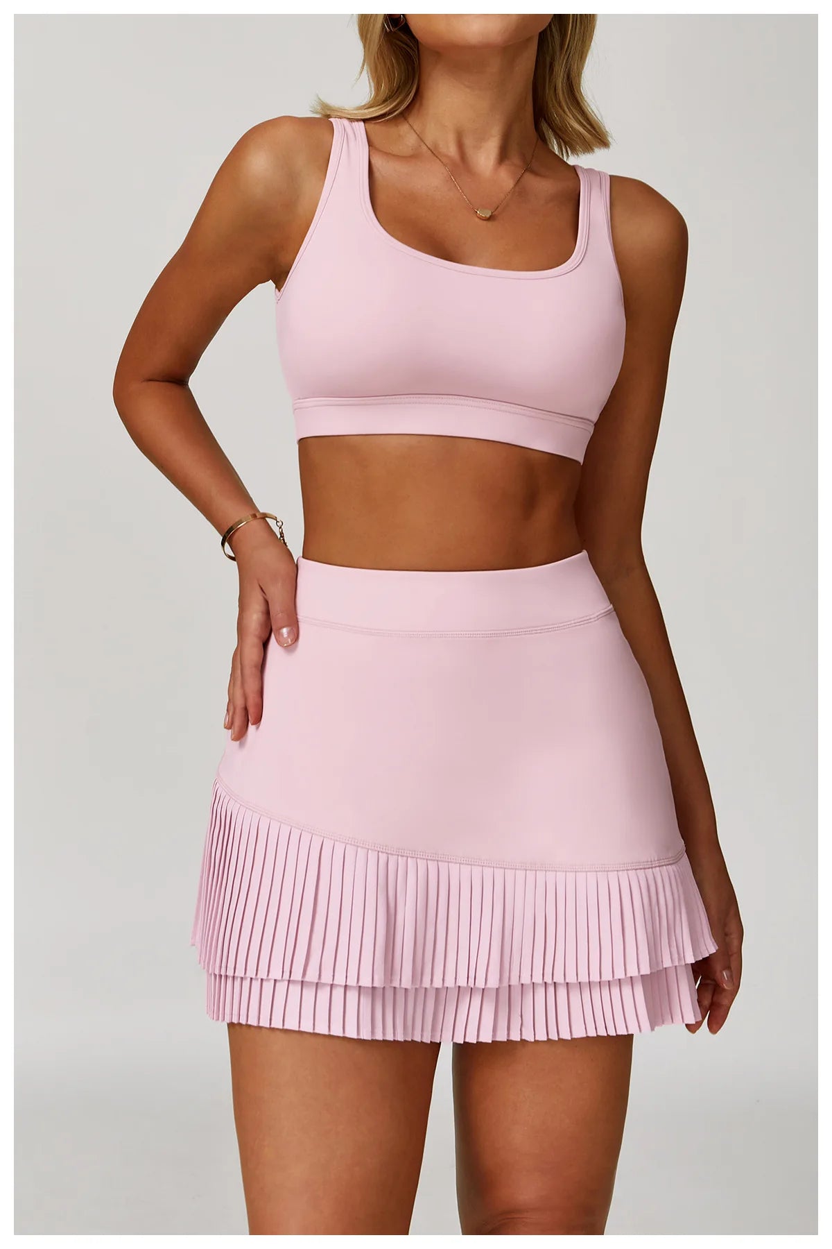Women's fitness yoga and gym outfit set by The Clothing Company Sydney, includes sports bra, leggings, and workout tracksuits.