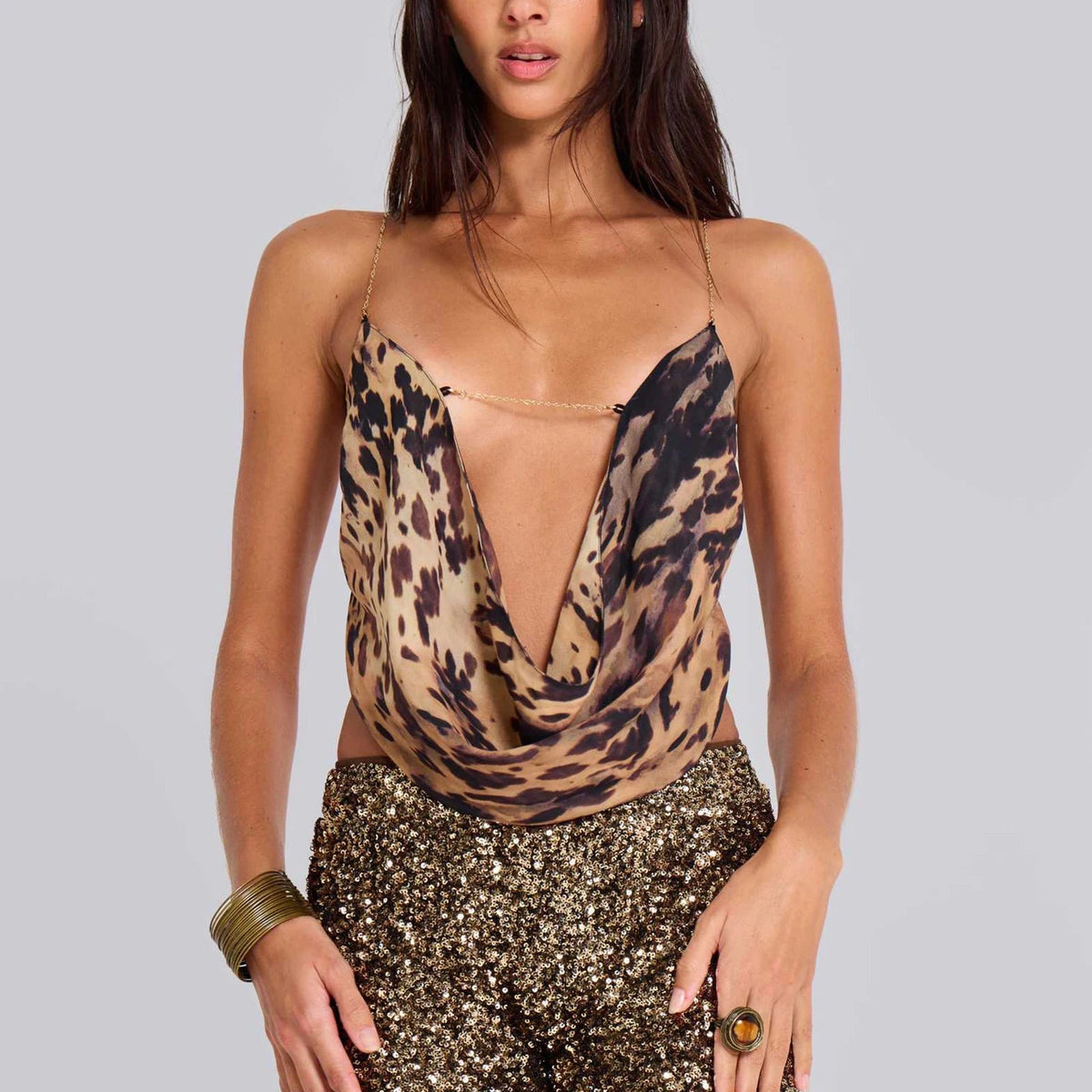 Women's Y2K style camisole tank top with deep V-neck, spaghetti straps, in a crop top design by The Clothing Company Sydney