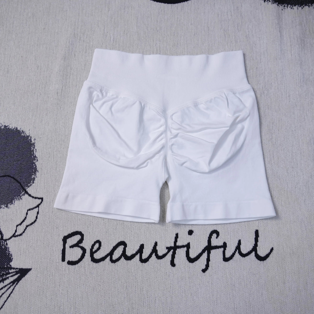 Women's high-waisted seamless yoga shorts by The Clothing Company Sydney, breathable gym and running shorts with a butt-lifting design.