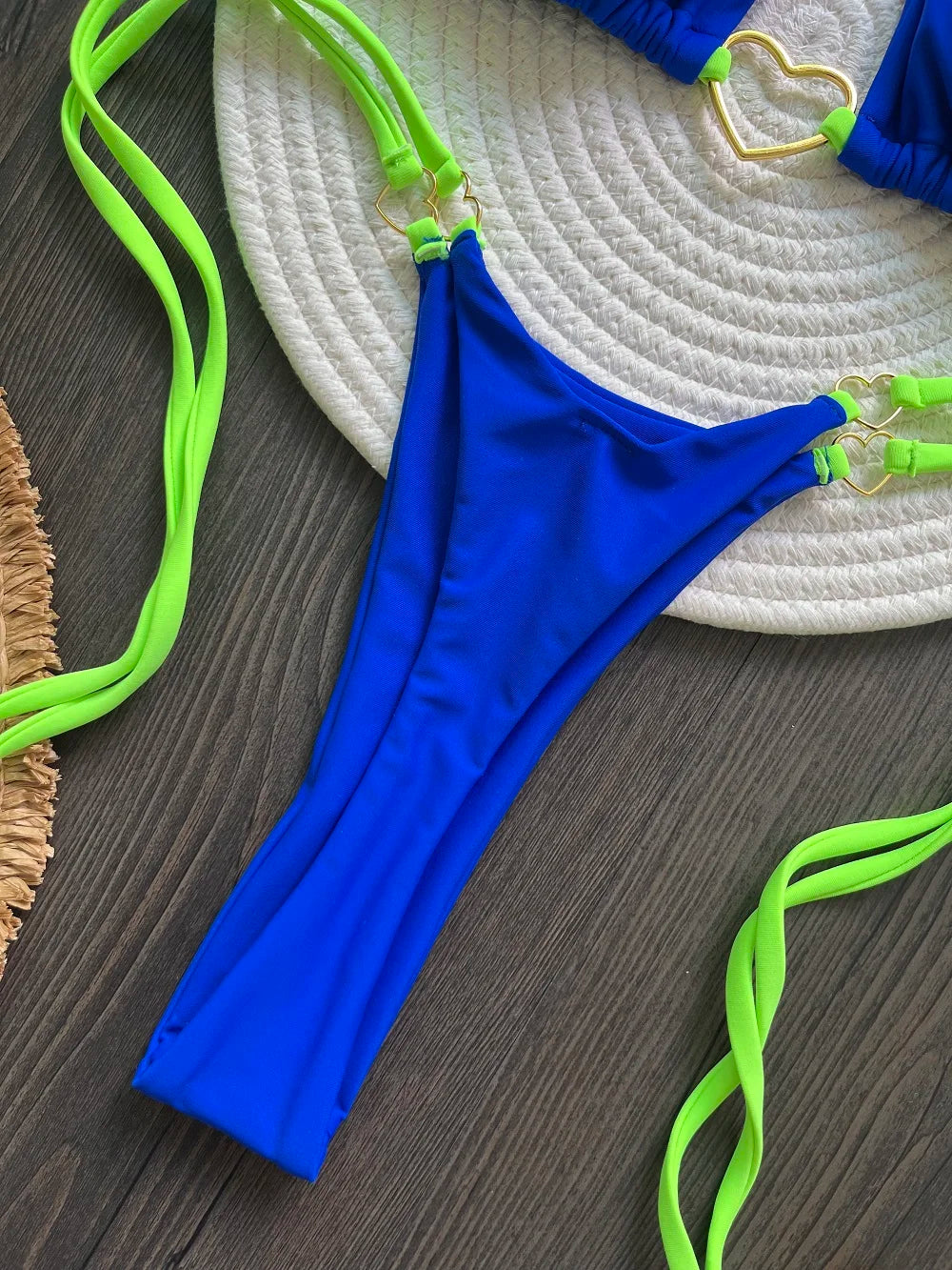 Solid color halter bikini set for women, two-piece swimsuit with triangle top and thong bottoms by The Clothing Company Sydney