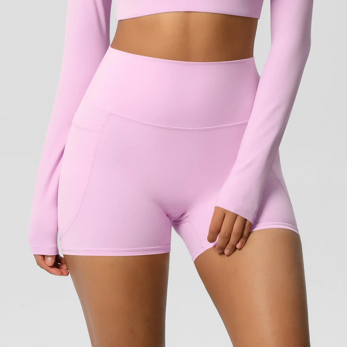 High-waisted bicycle yoga pants with pockets, quick-drying, breathable fabric, gym push-up fit, from The Clothing Company Sydney.