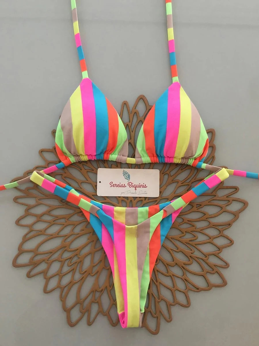 Two-piece lace-up print Brazilian swimsuit set by The Clothing Company Sydney, backless beachwear thong micro bikini on a model.