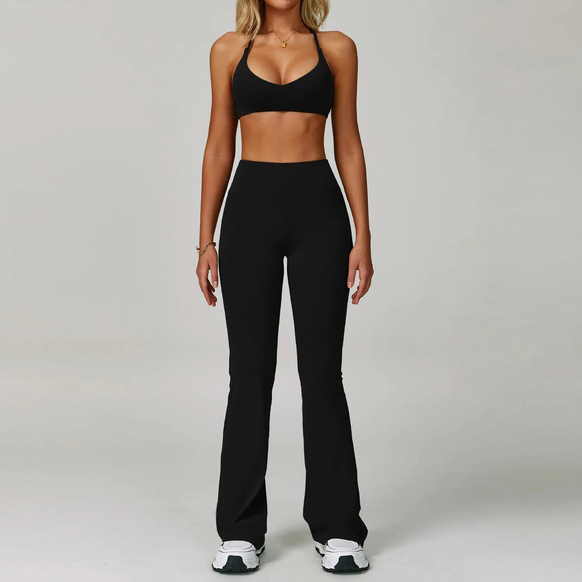 Women's fitness tracksuit set by The Clothing Company Sydney featuring a high-waist leggings and sports bra for workout and yoga.
