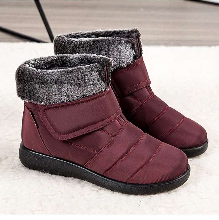 Women's fur-lined waterproof ankle boots by The Clothing Company Sydney with plush insoles and rubber soles for winter warmth.