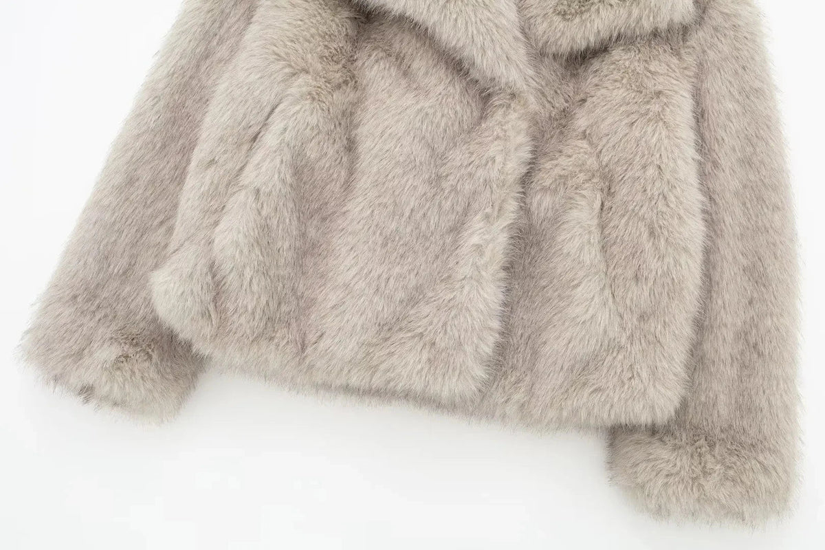 Women's faux fur cropped jacket by The Clothing Company Sydney featuring long sleeves, snap buttons, lapel collar, and thick outerwear.