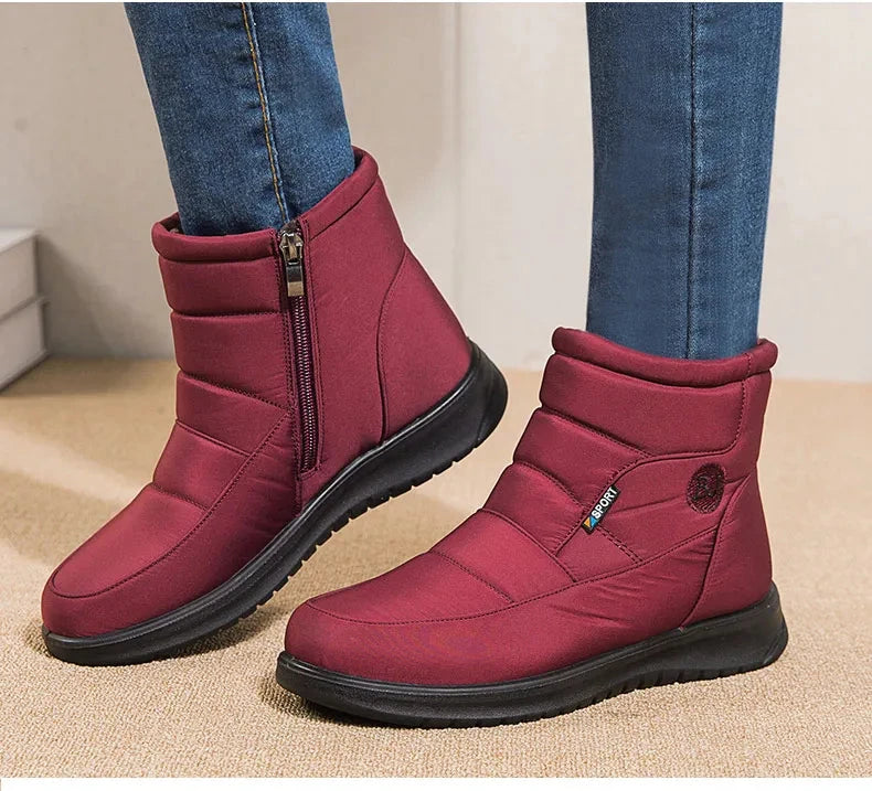 Women’s ankle low heel snow boots by The Clothing Company Sydney, stylish winter flat shoes with durable soles and cozy lining.