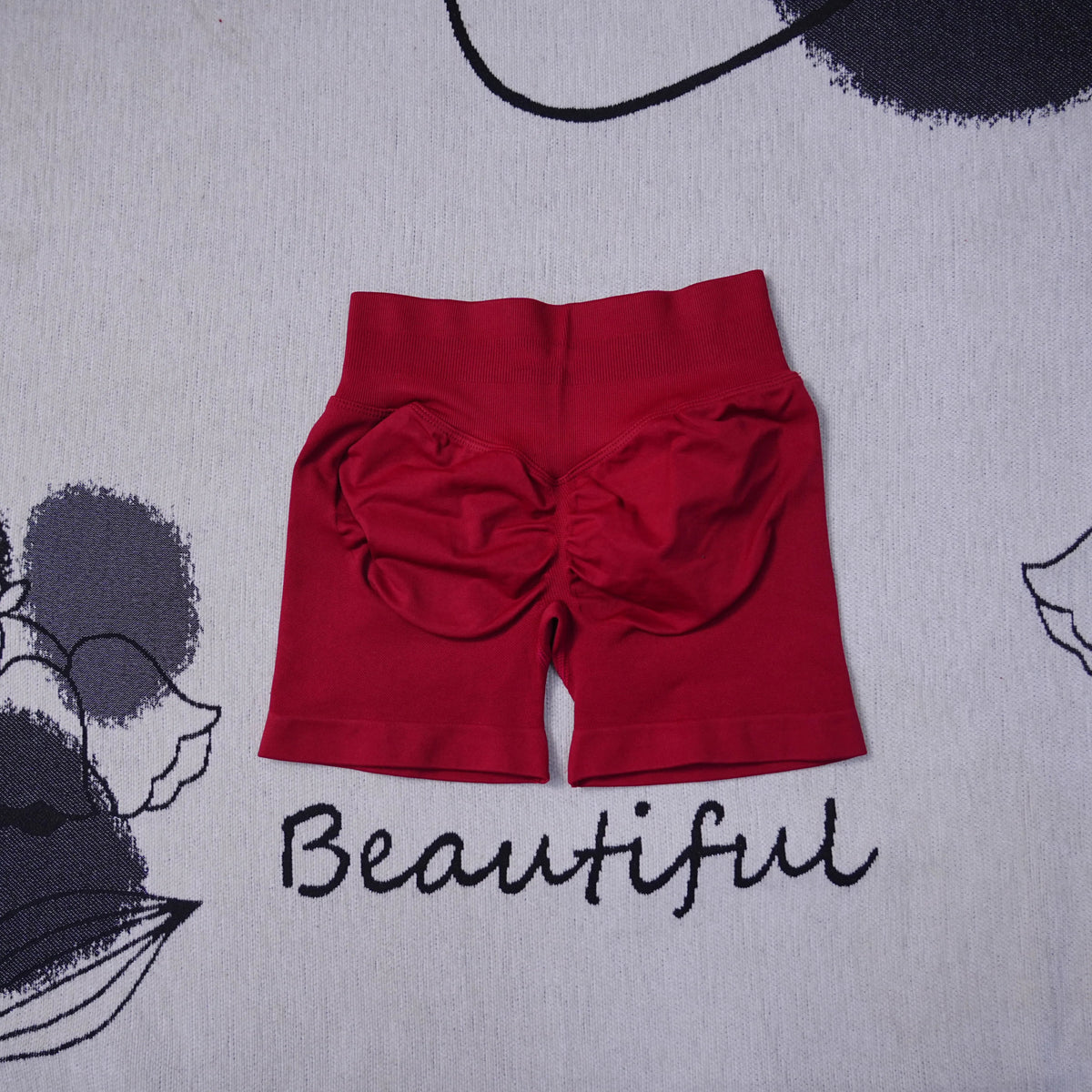 Women's high-waisted seamless yoga shorts by The Clothing Company Sydney, breathable, gym-ready, with a butt-lifting fit.