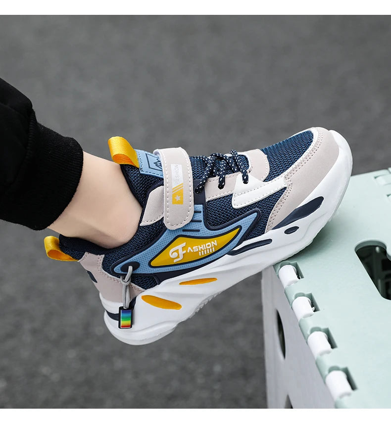 Boys’ breathable mesh sneakers by The Clothing Company Sydney with non-slip soles, lightweight design, and hook-and-loop closure.