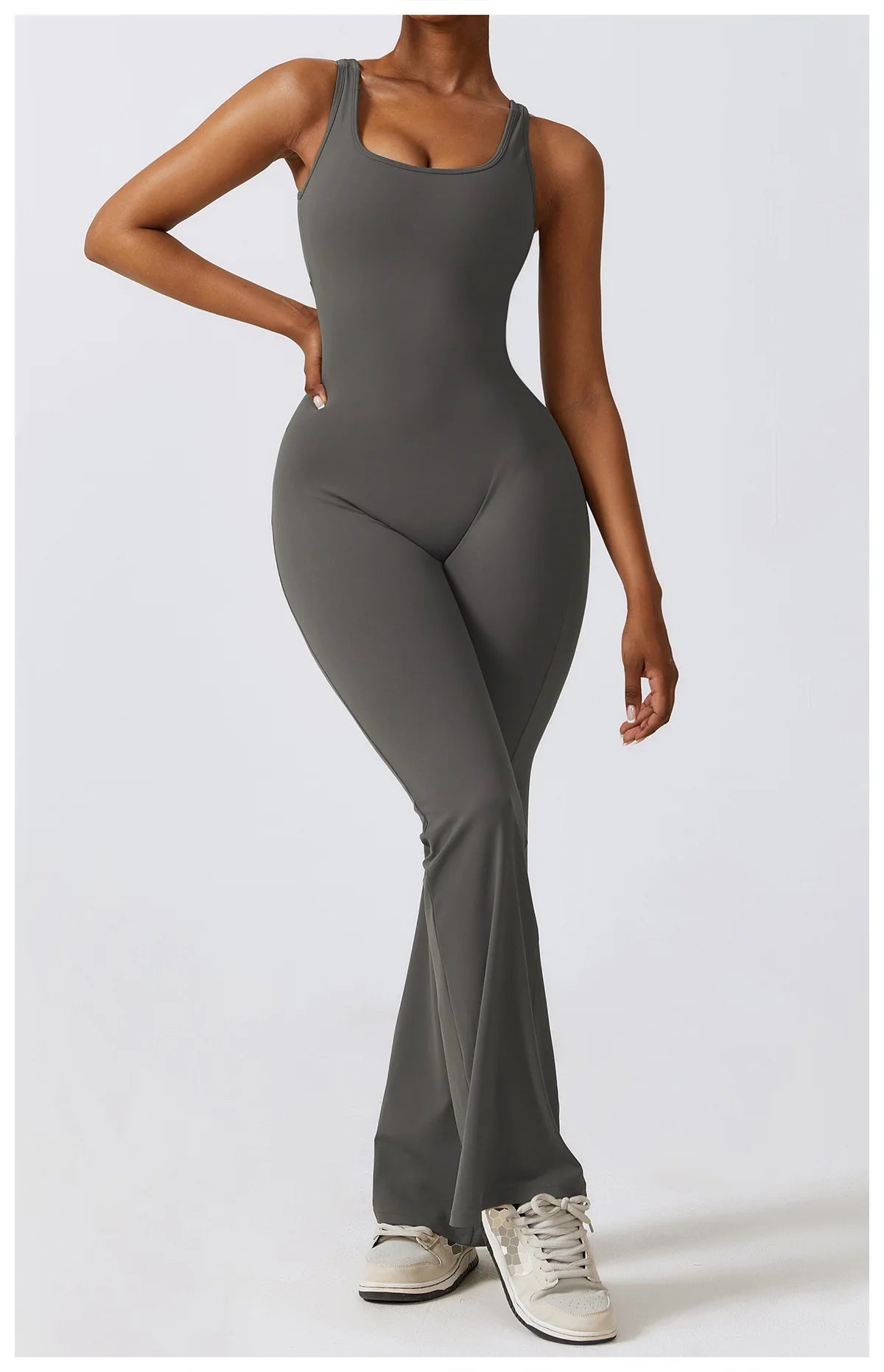 Open back V jumpsuit gym set for women, stylish fitness romper with stretch fabric, ideal for yoga, training, and workout sessions.