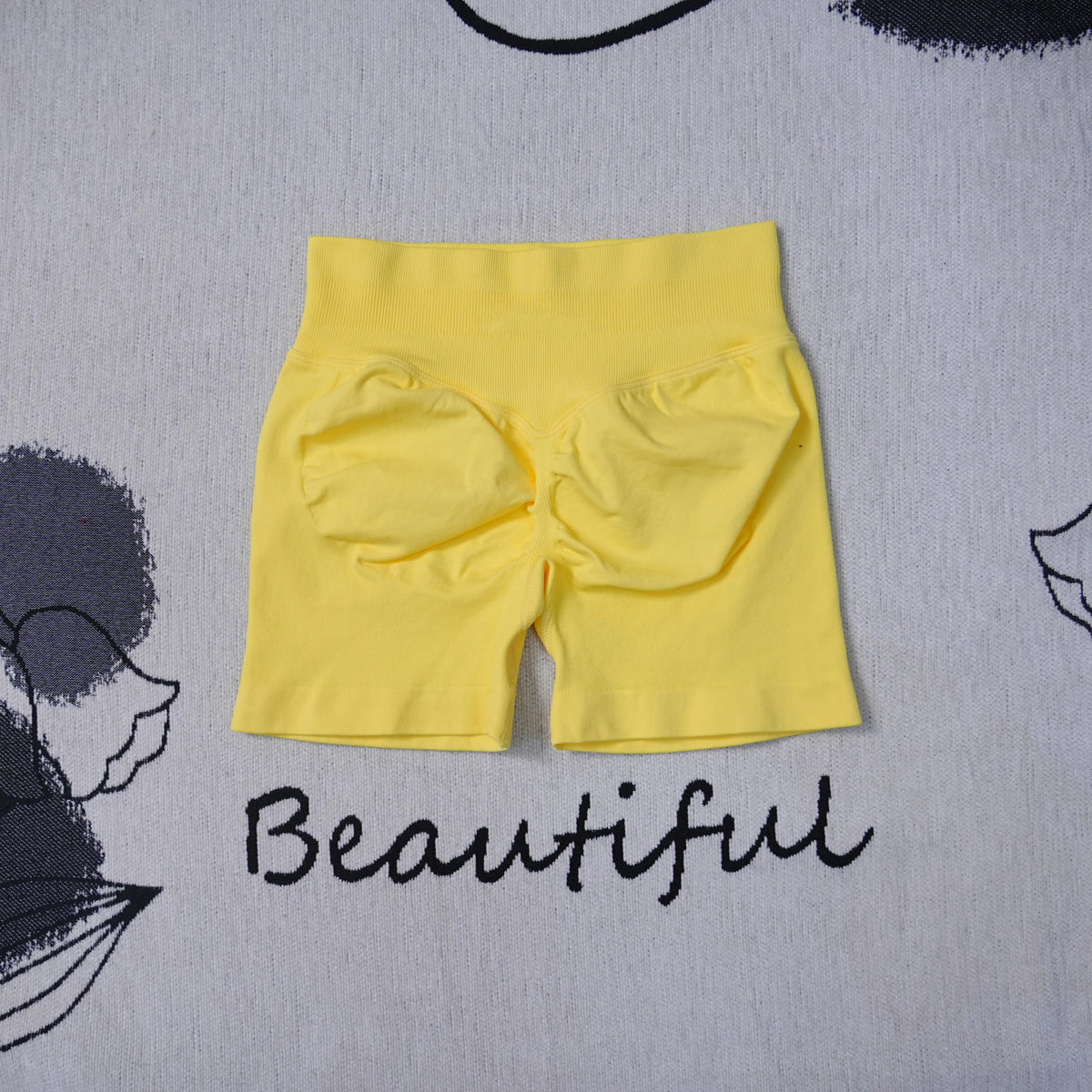 Women's high-waisted seamless yoga shorts by The Clothing Company Sydney, breathable fitness shorts ideal for gym, running, and biking.