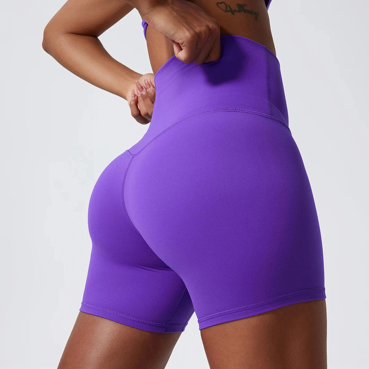 High-waist yoga shorts and gym leggings for women, featuring a snug fit and athletic design for running, workout, and biking.