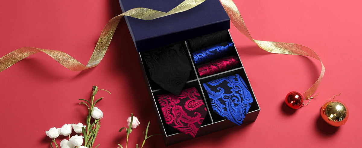 Luxury men's tie set with paisley and striped necktie, handkerchief, and accessories in a gift box by The Clothing Company Sydney.