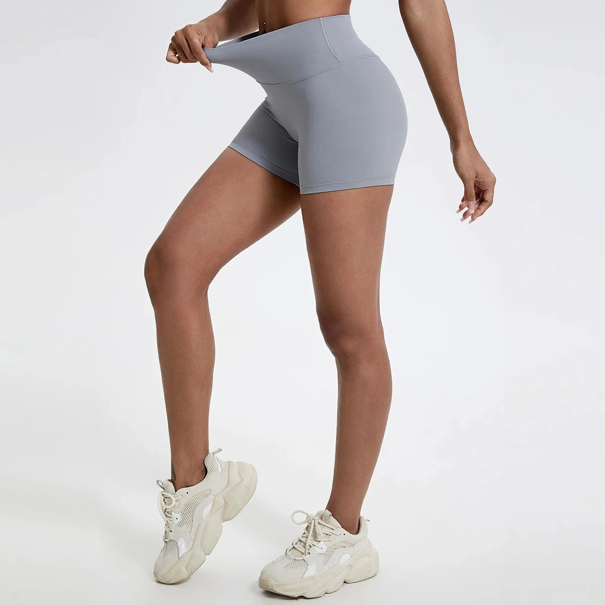 Women's high waist fitness leggings from The Clothing Company Sydney, designed for running, cycling, and yoga workouts.
