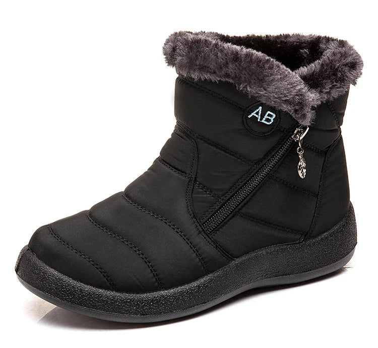 Women’s winter snow boots with warm fur lining, ankle height, waterproof footwear by The Clothing Company Sydney.