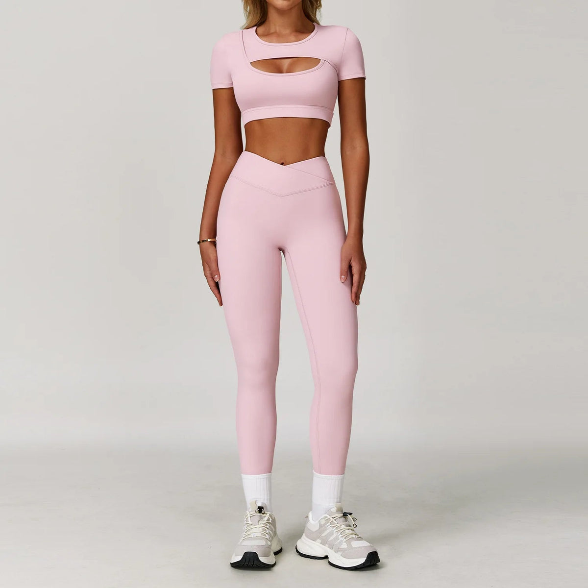 Women's fitness yoga and gym outfit set featuring sports bra and leggings from The Clothing Company Sydney for workout and active wear.