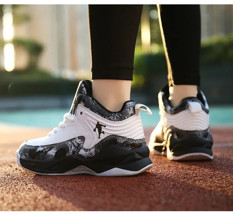 Kids basketball shoes by The Clothing Company Sydney featuring non-slip sports sneakers with vibrant design and supportive cushioning.